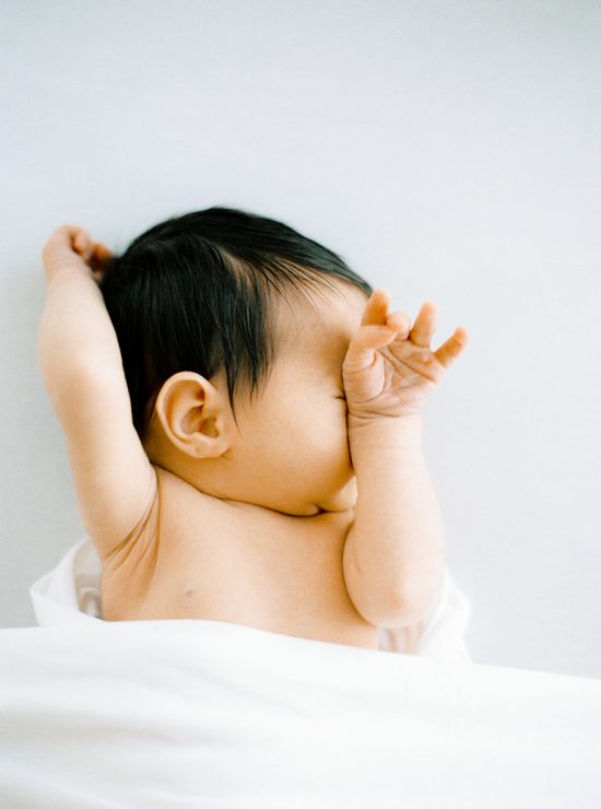 Newborn baby stretching